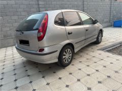 Photo of the vehicle Nissan Almera Tino