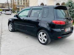 Photo of the vehicle Mazda Demio