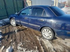 Сүрөт унаа Mitsubishi Carisma