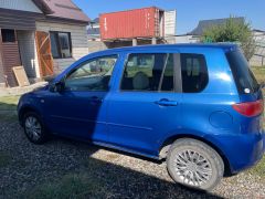 Photo of the vehicle Mazda Demio