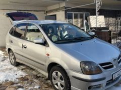 Фото авто Nissan Almera Tino