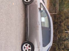 Photo of the vehicle Honda Fit Aria