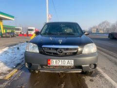 Photo of the vehicle Mazda Tribute