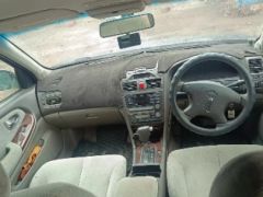 Photo of the vehicle Nissan Cefiro