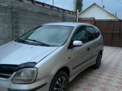 Photo of the vehicle Nissan Almera Tino