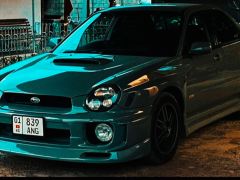 Фото авто Subaru Impreza WRX