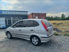 Фото авто Nissan Almera Tino