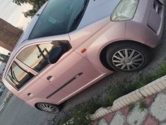 Фото авто Daihatsu Cuore