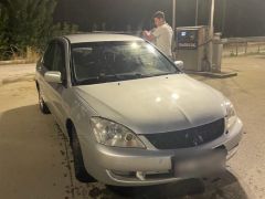 Сүрөт унаа Mitsubishi Lancer