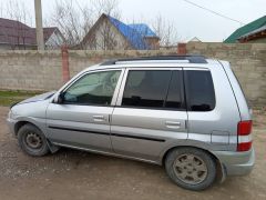 Photo of the vehicle Mazda Demio