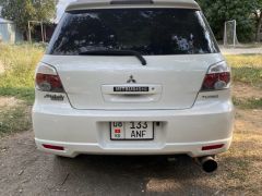 Фото авто Mitsubishi Airtrek