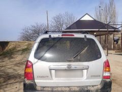 Photo of the vehicle Mazda Tribute