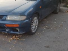 Сүрөт унаа Mazda 323