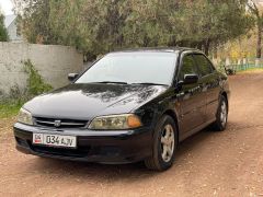 Photo of the vehicle Honda Torneo