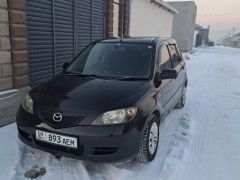 Photo of the vehicle Mazda Demio