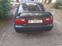 Photo of the vehicle Mazda 323