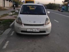 Сүрөт унаа Toyota Passo