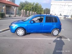 Сүрөт унаа Mazda Demio