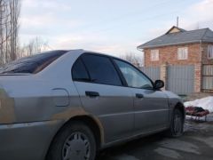 Фото авто Mitsubishi Lancer