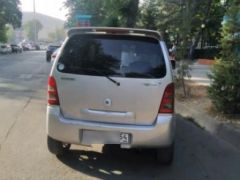 Photo of the vehicle Suzuki Wagon R+