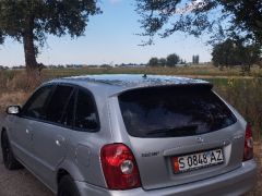 Фото авто Mazda 323