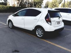 Фото авто Toyota Prius c