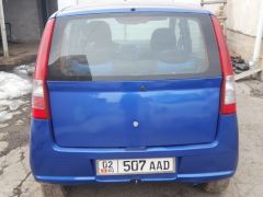 Фото авто Daihatsu Cuore