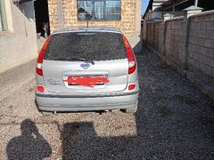 Фото авто Nissan Almera Tino