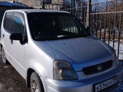 Фото авто Honda Capa