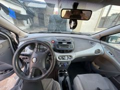 Сүрөт унаа Nissan Almera Tino