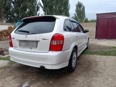 Фото авто Mazda Familia