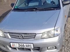 Photo of the vehicle Mazda Demio