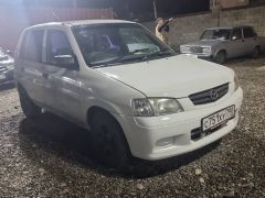 Photo of the vehicle Mazda Demio