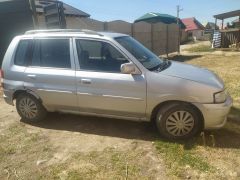 Photo of the vehicle Mazda Demio