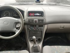 Сүрөт унаа Toyota Corolla