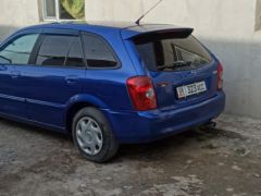 Сүрөт унаа Mazda 323