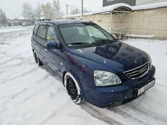 Photo of the vehicle Kia Carens