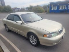 Фото авто Mazda 626