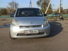 Фото авто Toyota Passo