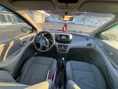 Фото авто Nissan Almera Tino