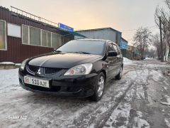 Фото авто Mitsubishi Lancer