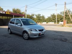 Photo of the vehicle Mazda Demio