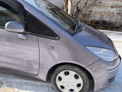 Photo of the vehicle Mitsubishi Colt