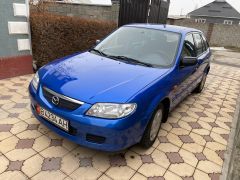 Фото авто Mazda 323