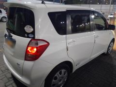 Photo of the vehicle Toyota Ractis