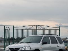 Фото авто Mazda Tribute