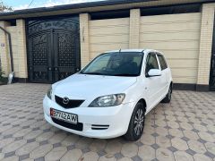 Фото авто Mazda Demio