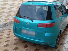 Photo of the vehicle Mazda Demio