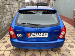 Фото авто Mazda 323