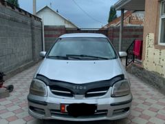 Photo of the vehicle Nissan Almera Tino